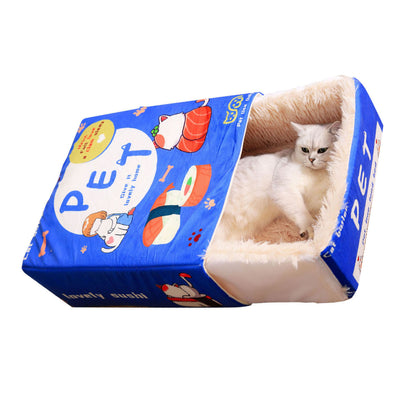 Chat blanc allongé dans un lit Snack Box cartoon bleu – panier fermé 4 saisons pour chat